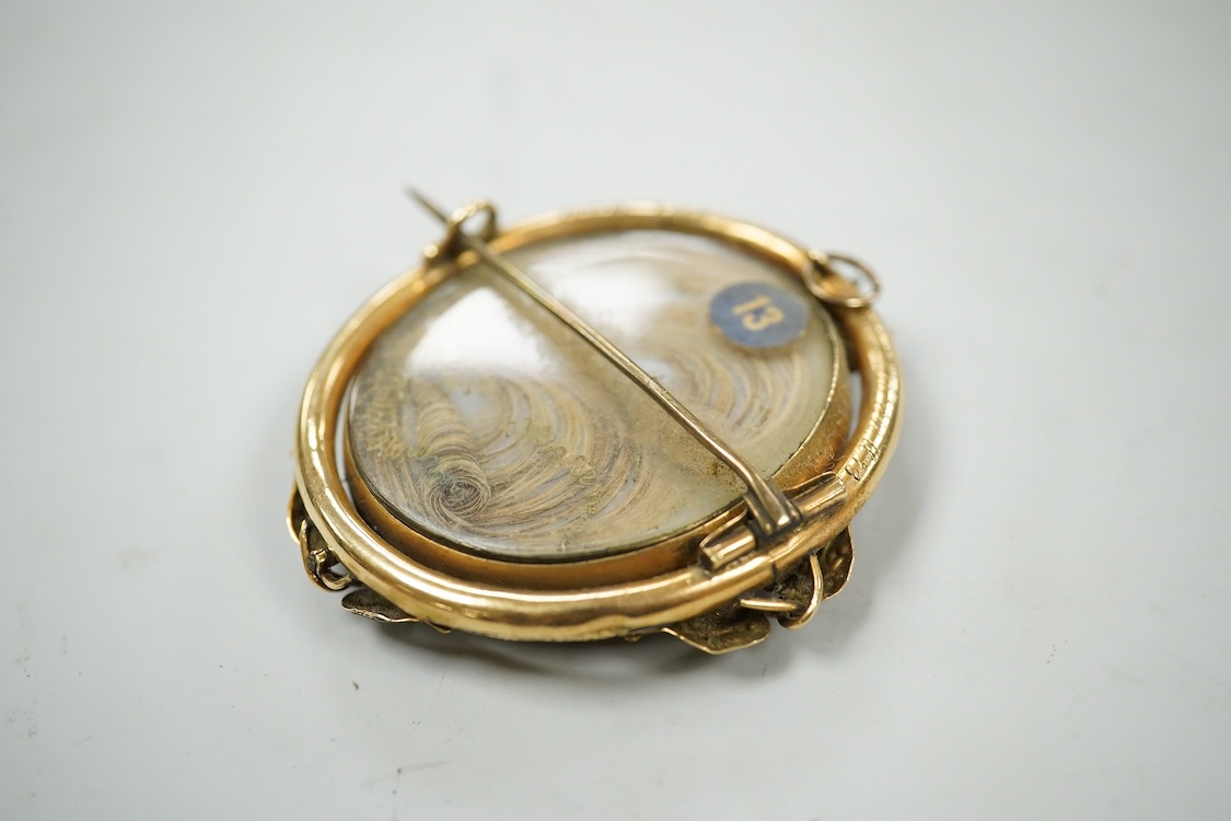 19th century, English School, mourning portrait miniature for James Lord, OBT 3rd Feb. 1860, A.78, housed in a yellow metal (tests as gold) and enamelled pendant brooch frame with hair-work and seed pearl panel verso, wa